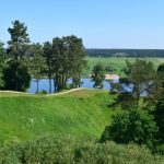 Sudargo piliakalniai, toliau matyti upė